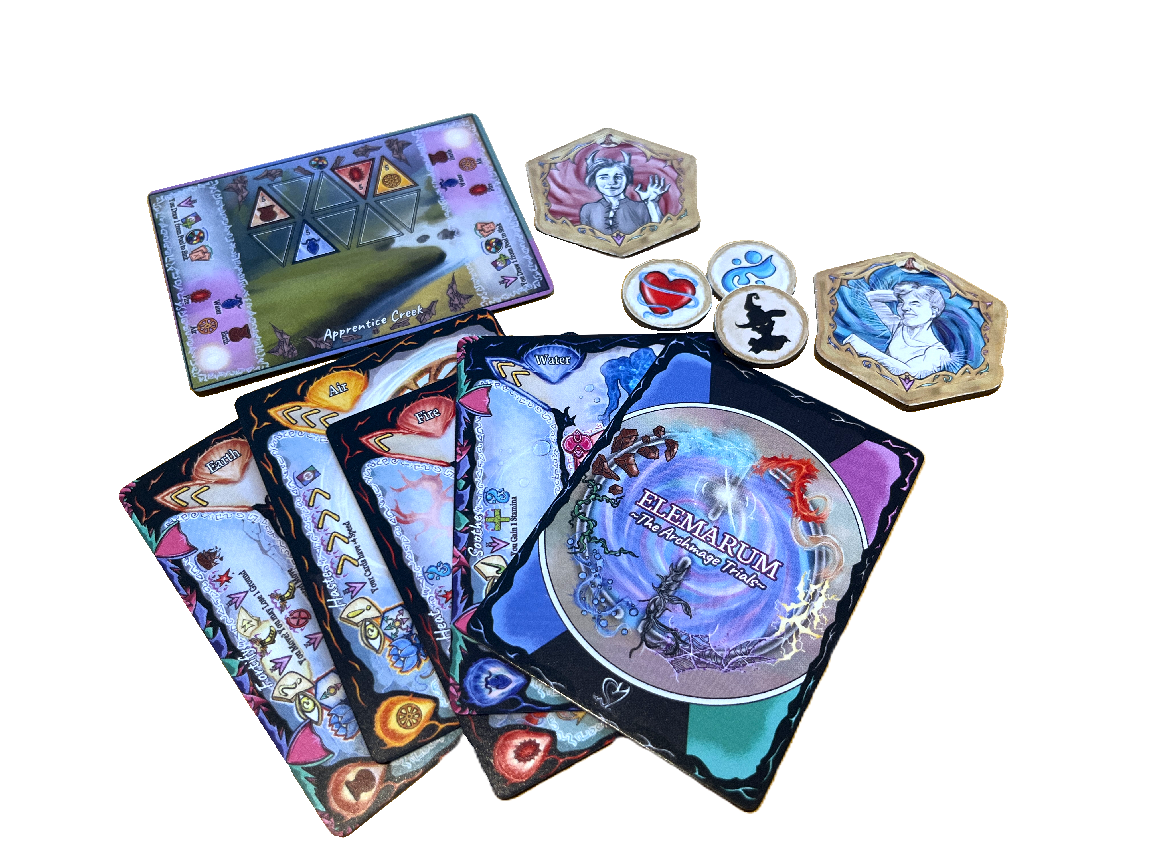 Some of the contents of Elemarum: The Archmage Trials game, specifically some cards and tokens.